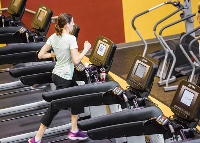 Woman running on treadmill