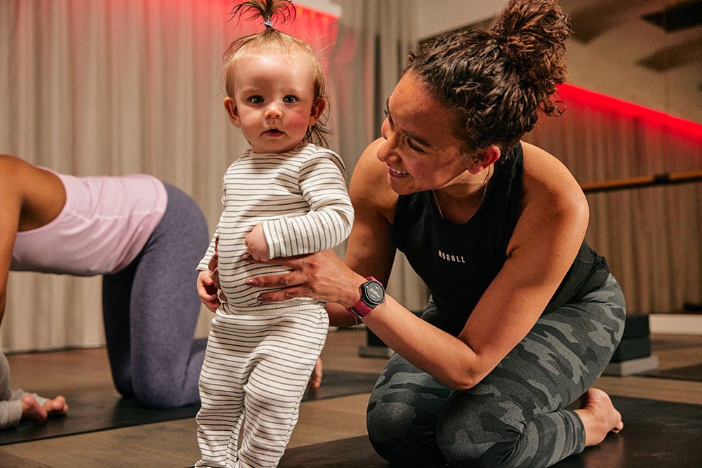 Mother and baby in a yoga studio