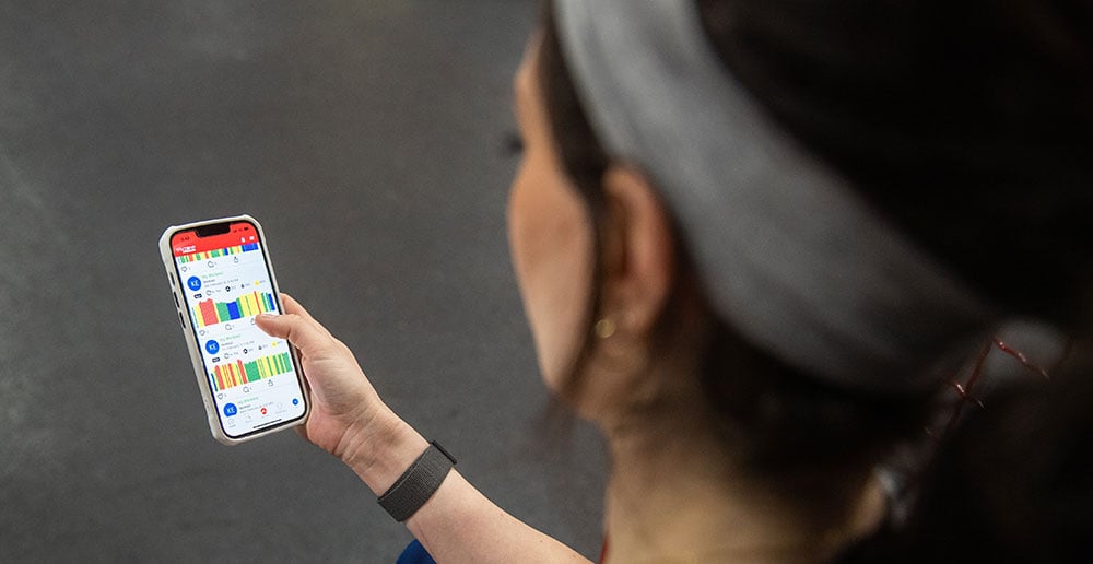 Woman looking at the Myzone app