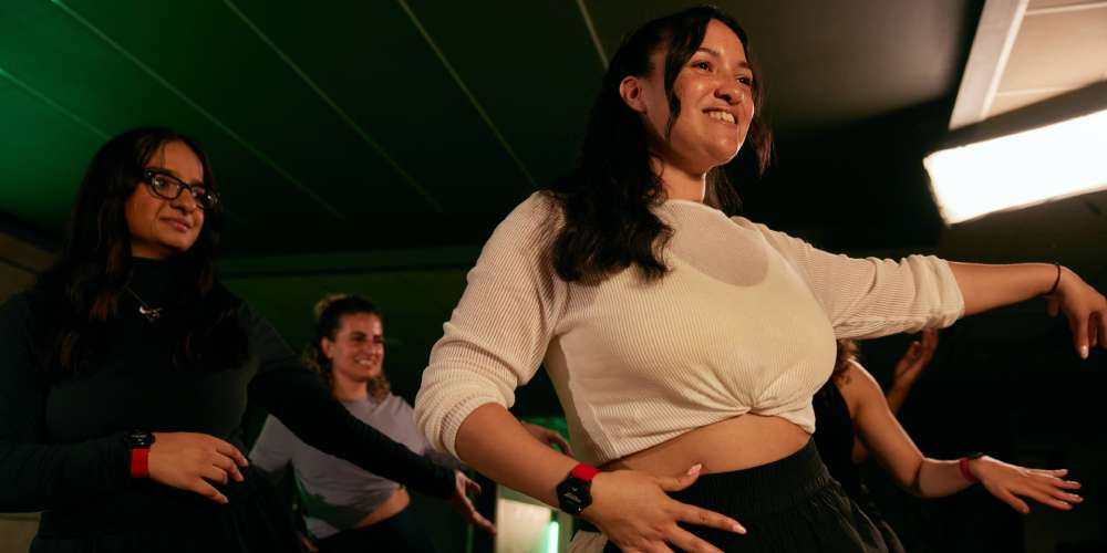 Shanika leading a dance class in the studio