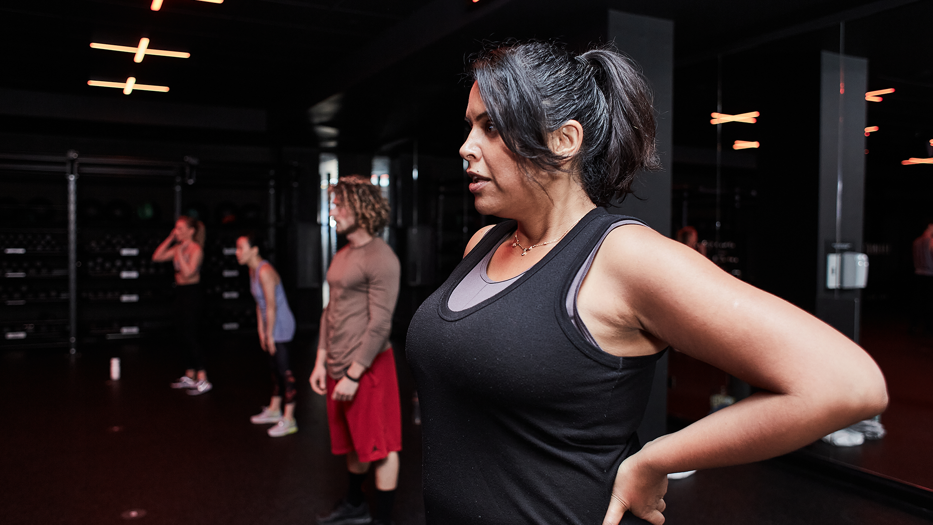 Circuit training class participants in the gym