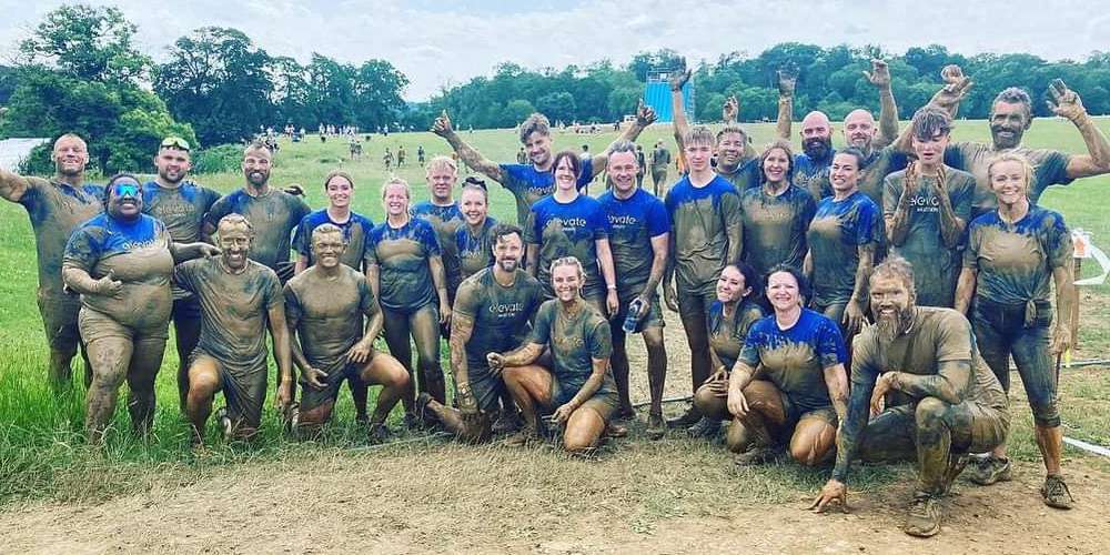 Elevate Fitness taking on a Tough Mudder obstacle course race as a team