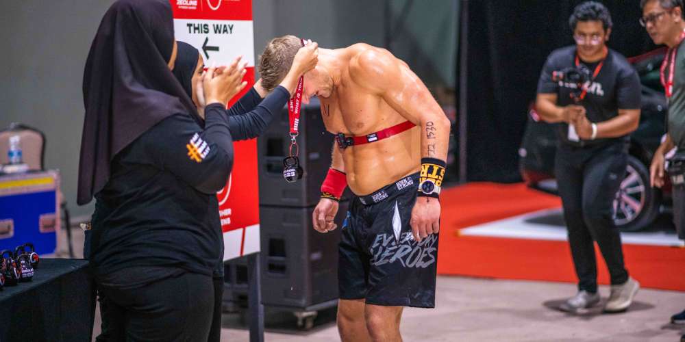 REDLINE Fitness Games winner Marcus Funken being awarded a medal