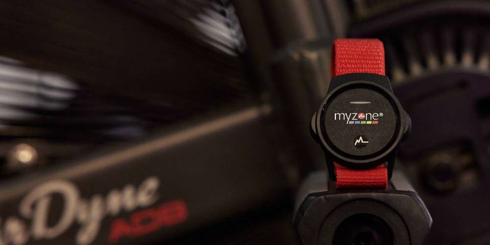A Myzone Switch heart rate monitor on some cardio equipment