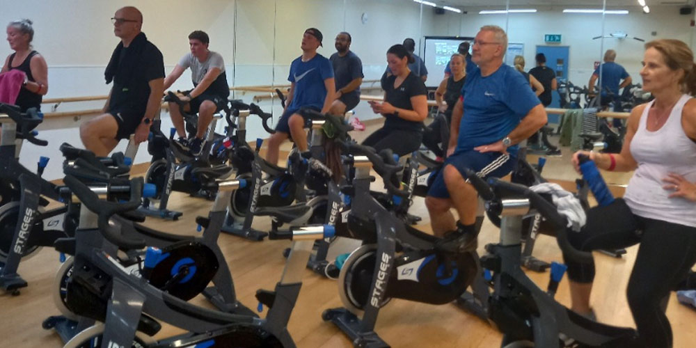 tmactive class members on exercise bikes
